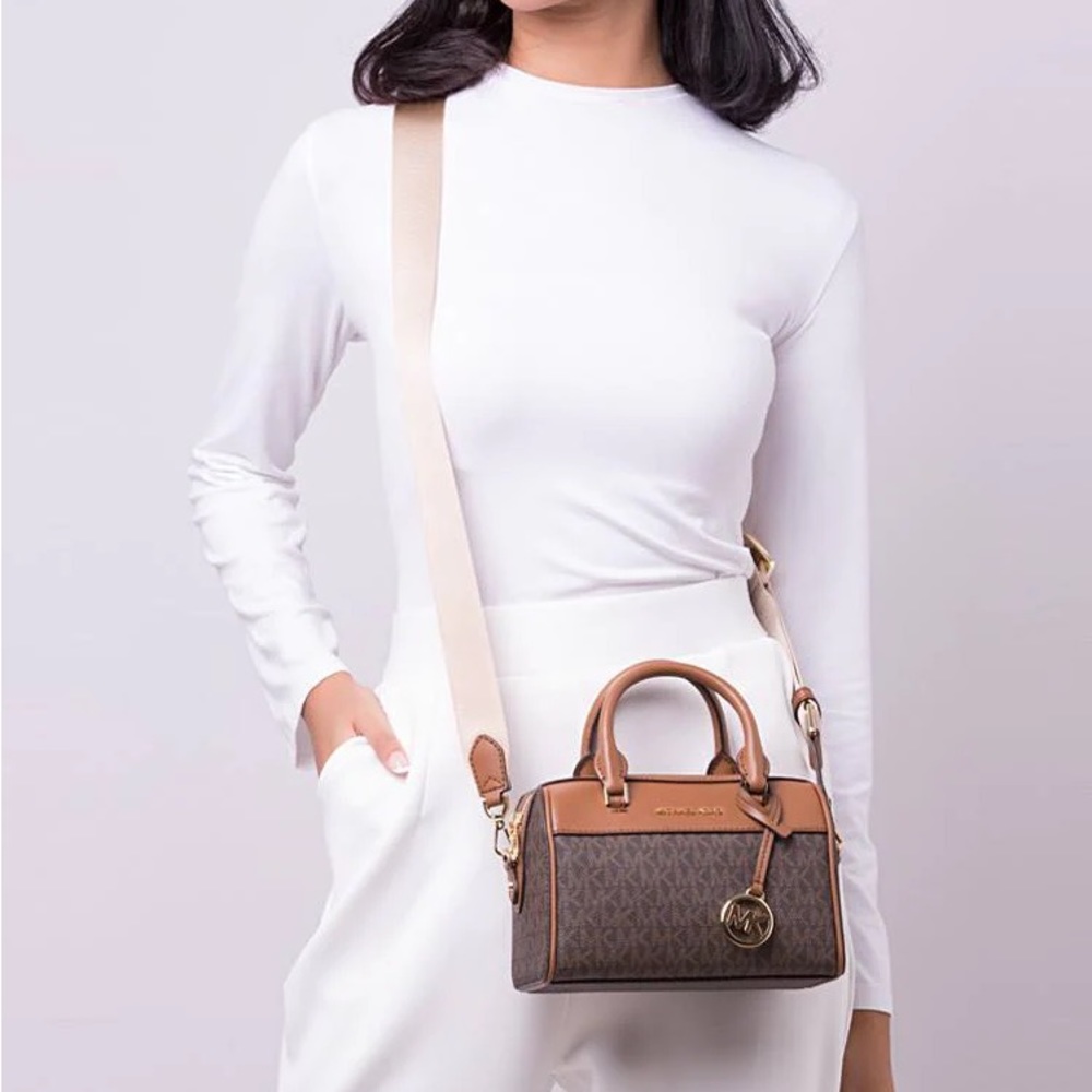 Authentic Michael Kors travel XS Signature PVC duffle crossbody bag